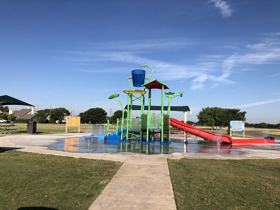 Scenic Redbud Park located in River Oaks Brookhollow, Abilene, TX 79605, known for its family-friendly spaces, playgrounds, and sports areas.